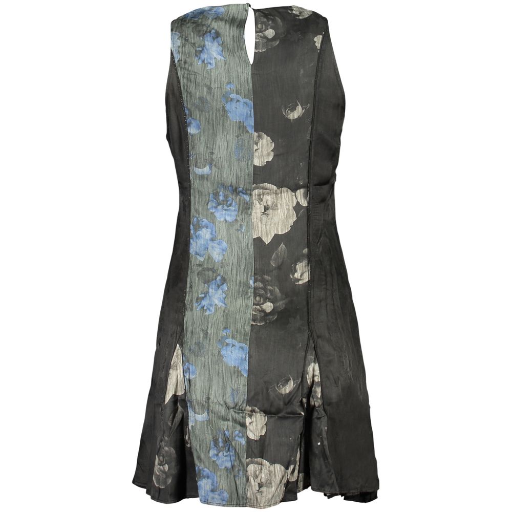 Dress by Desigual for women in viscose black & patterned features an eye catching silhouette with a sophisticated , elegant , and a refined short for a eye catching aesthetic.