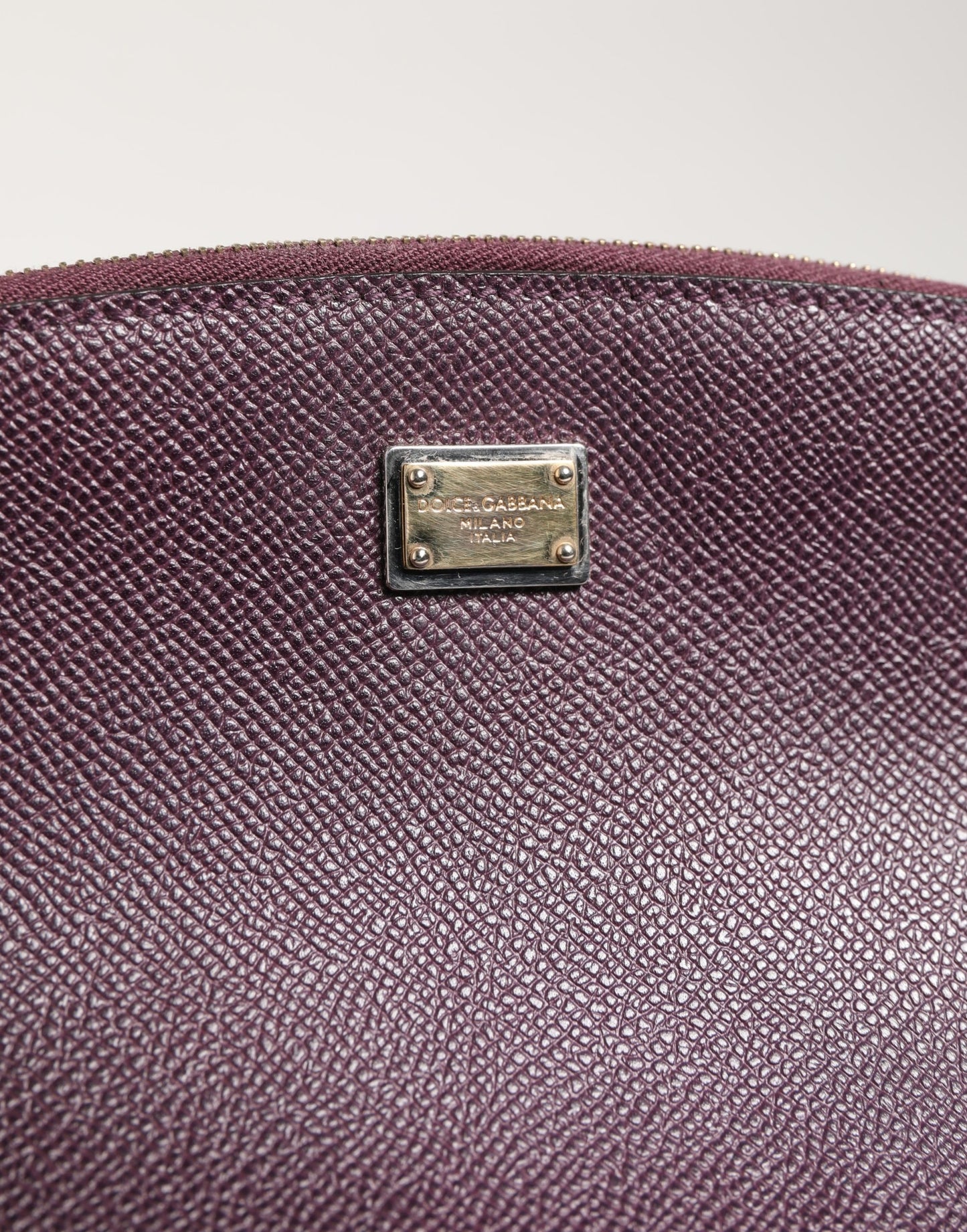 Card Case by Dolce & Gabbana for women in calfskin leather black & purple features a distinguished silhouette, showcasing the distinguished design of the Calfskin Leather Card Case with refined zip-around.