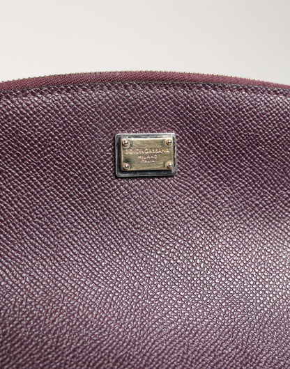 Card Case by Dolce & Gabbana for women in calfskin leather black & purple features a distinguished silhouette, showcasing the distinguished design of the Calfskin Leather Card Case with refined zip-around.