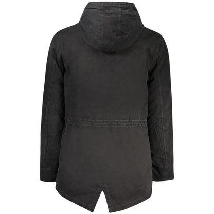 This Hooded Parka by U.S. Grand Polo for men in sheep leather polyester fur black presents a enveloping silhouette, meticulously detailed with pockets & hooded and a enveloping hooded neckline.