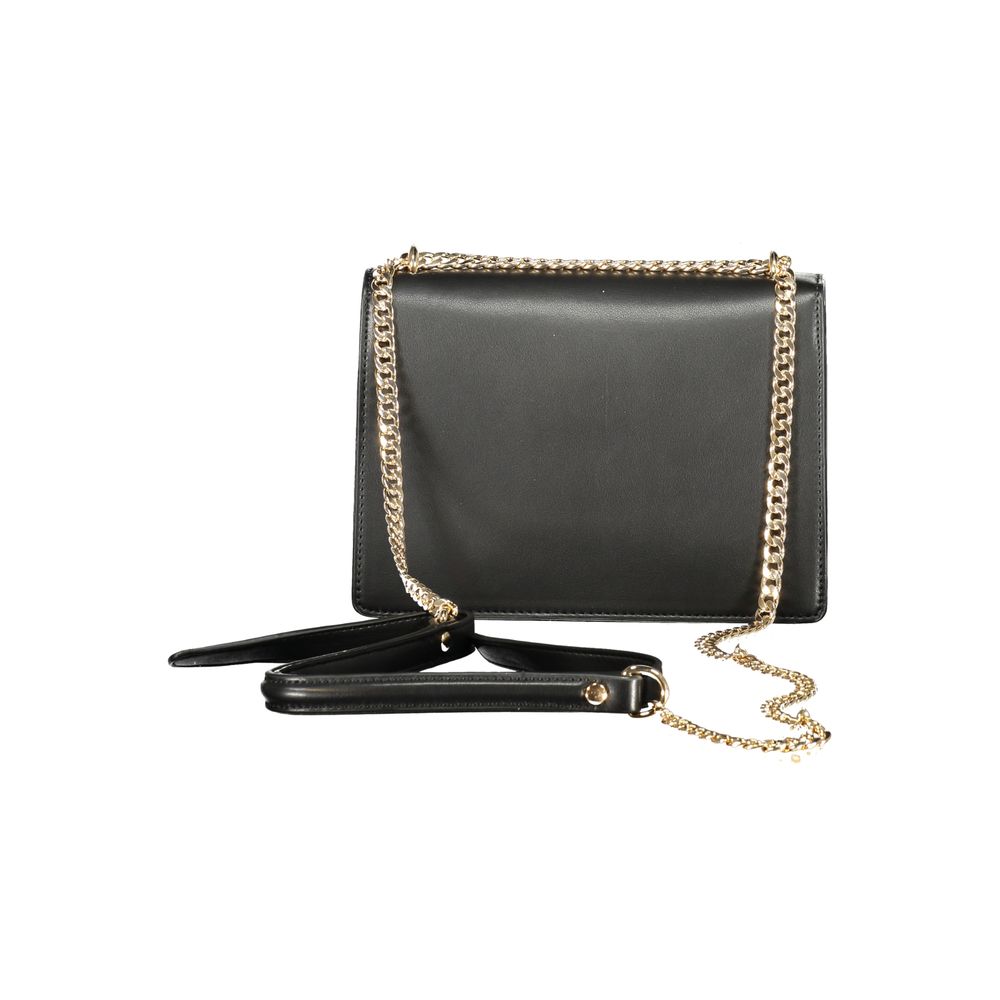 This Shoulder Handbag by Cafenoir for women in polyurethane leather and black presents a sculptural silhouette featuring a secure snap, ample built-in-compartments & external-pockets, and versatile shoulder-strap for a sculptural finish.