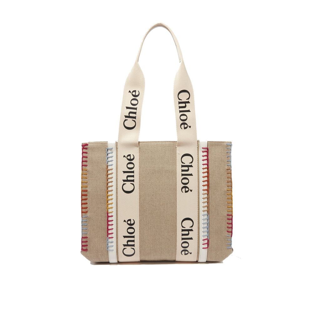 Large Tote Bag by Chloé for women in calfskin leather beige features a jet-set Calfskin Leather Large Tote Bag design, complete with a secure , ample , and versatile handle for a jet-set look.