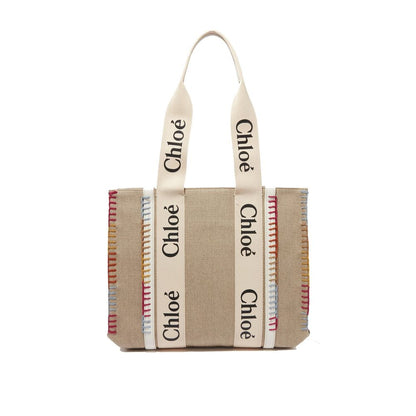Large Tote Bag by Chloé for women in calfskin leather beige features a jet-set Calfskin Leather Large Tote Bag design, complete with a secure , ample , and versatile handle for a jet-set look.