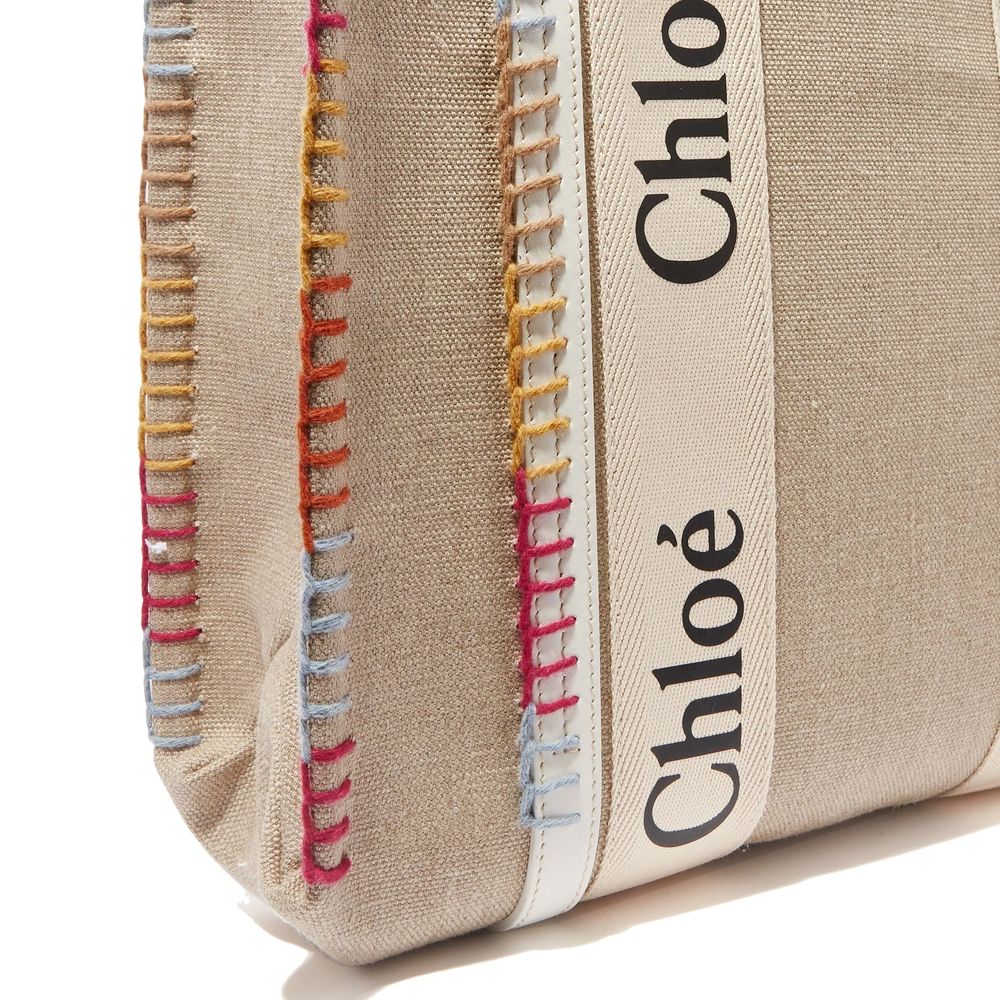 Large Tote Bag by Chloé for women in calfskin leather beige features an jet-set-ready silhouette, showcasing the Calfskin Leather Large Tote Bag design with a secure , ample , and versatile handle.