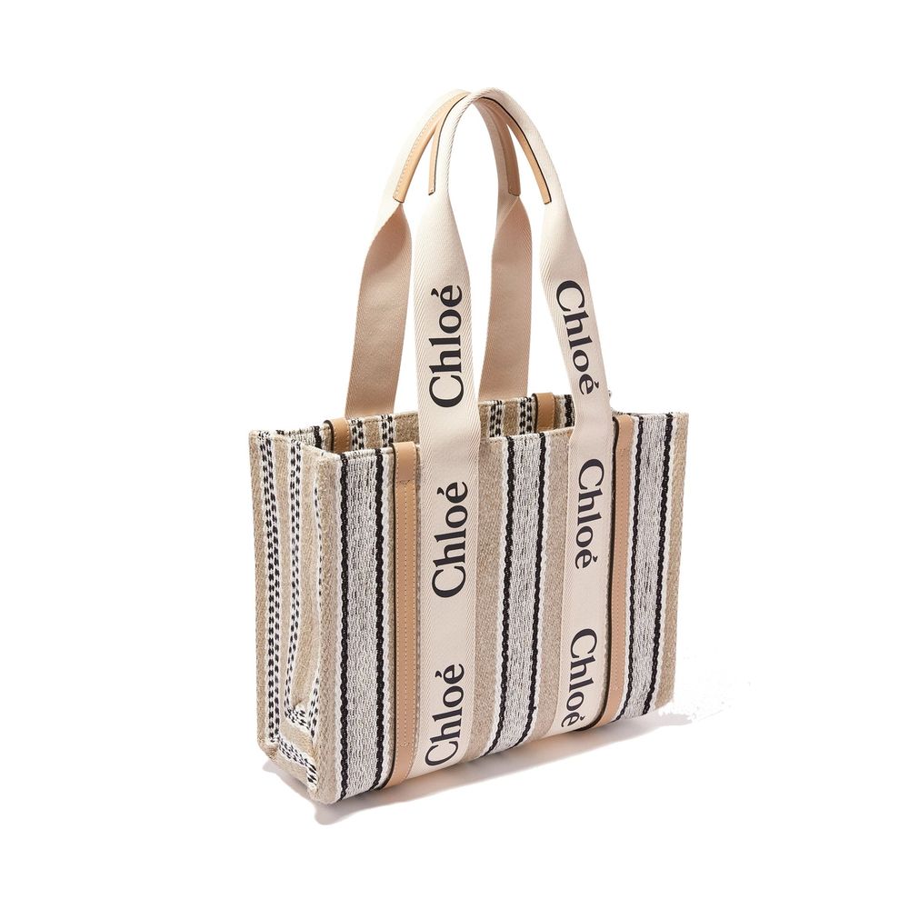 This Large Tote Bag by Chloé for women in linen beige & signature features an jet-set Linen Large Tote Bag design with a secure , ample , and jet-set handle.