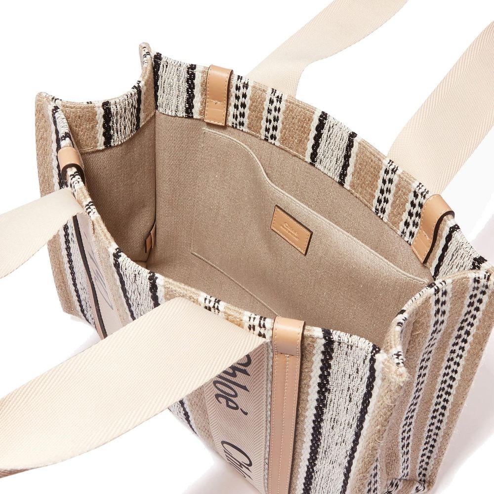 Large Tote Bag by Chloé for women in linen beige & signature features a jet-set sophisticated Linen Large Tote Bag design with a secure , ample , and versatile handle for a jet-set sophisticated finish.