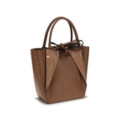 Small Shoulder Bag by Gabriela Hearst for women in suede lambskin leather brown presents a versatile silhouette, showcasing a secure and versatile with versatile shoulder-strap for a sophisticated look.