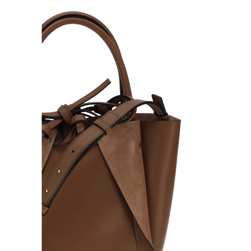 Small Shoulder Bag by Gabriela Hearst for women in suede lambskin leather brown features a effortless sophistication silhouette, secured by a with ample and versatile shoulder-strap for a effortless sophistication finish.