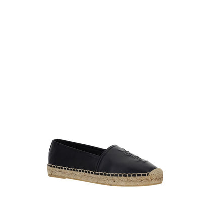 Espadrilles Flat Shoes by Saint Laurent for women in lambskin leather black & monogram showcases a resplendent Women's Lambskin Leather Espadrilles Flat Shoes aesthetic with a and .
