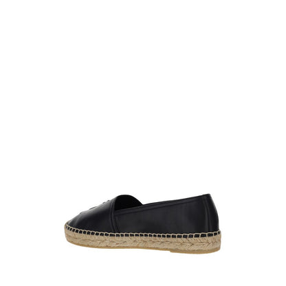 Espadrilles Flat Shoes by Saint Laurent for women in lambskin leather black & monogram features an statuesque silhouette from the Women's Lambskin Leather Espadrilles Flat Shoes collection, showcasing a and a statuesque for a statuesque look.