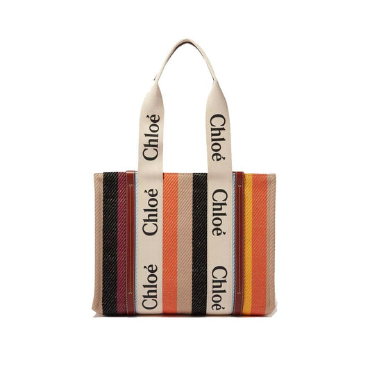 Tote Bag by Chloé for women in grained leather beige & signature features a jet-set Grained Leather Tote Bag design, complete with a secure , ample , and versatile handle for a jet-set look.