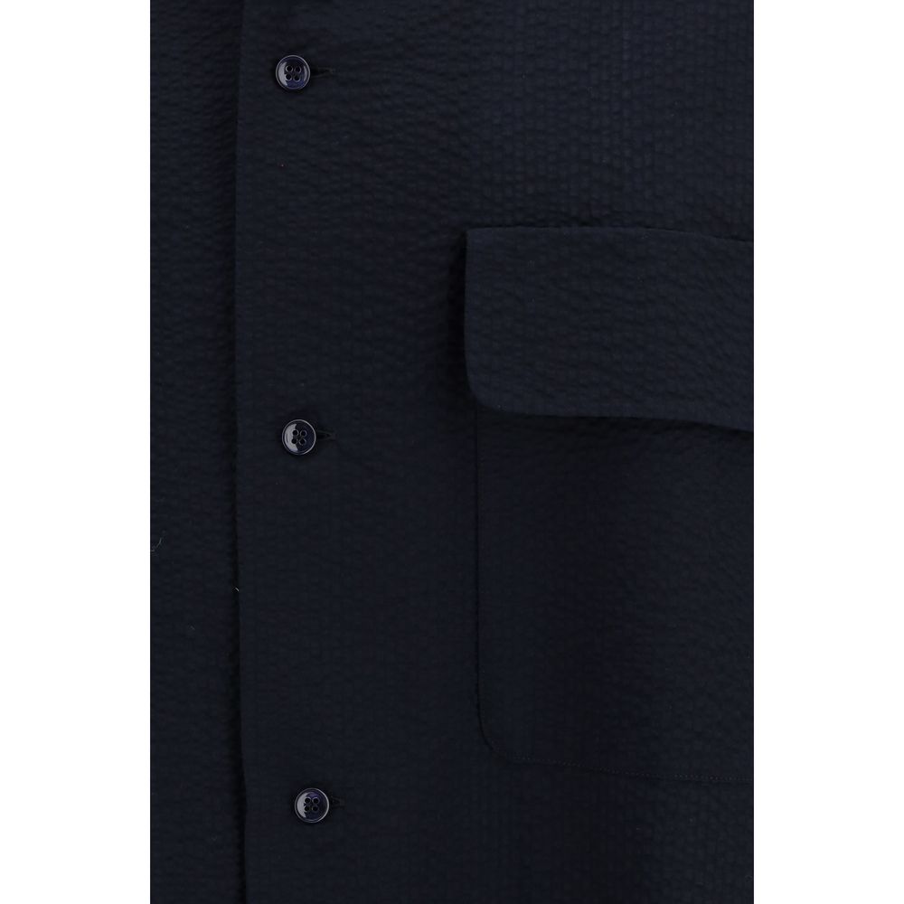 Shirt by Giorgio Armani for men in cotton blue presents a discerning silhouette, showcasing a sophisticated and for a truly discerning finish.