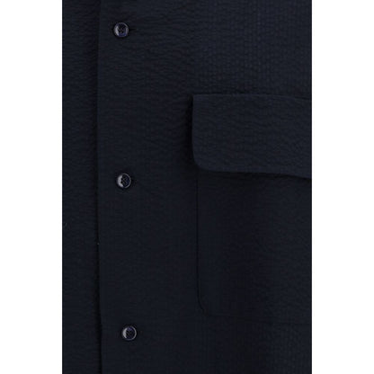 Shirt by Giorgio Armani for men in cotton blue presents a discerning silhouette, showcasing a sophisticated and for a truly discerning finish.