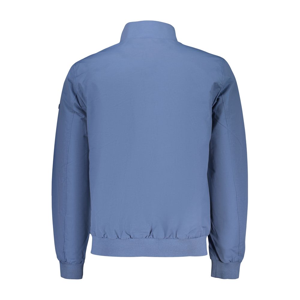Windbreaker Jacket by Norway 1963 for men in polyamide cotton blue features an stylish silhouette, showcasing a sophisticated and performance-driven pockets & windproof for a premium, stylish look.