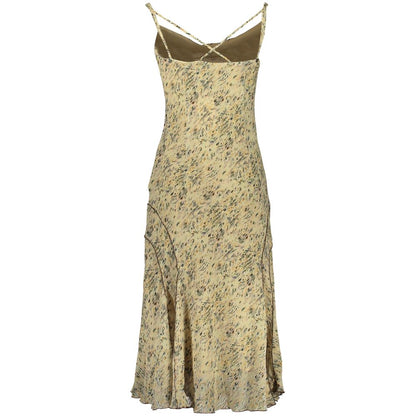 Dress by Desigual for women in polyester beige, patterned & print features a dramatic silhouette, showcasing an elegant and that flows into a dramatic long.