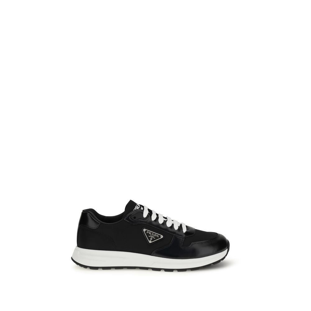 Athletic Sneakers by Prada for men in polyamide bos taurus calf leather black showcases an impeccable silhouette, defined by an impeccable athletic style design that perfectly captures the essence of the Men's Athletic Polyamide Bos Taurus Calf Leather Sneakers.