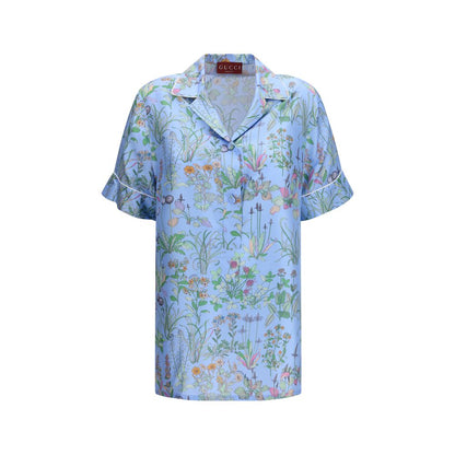 Shirt by Gucci for women in silk twill light-blue, patterned, floral & print features an architectural silhouette with a refined short-sleeve and elegant for a architectural look.