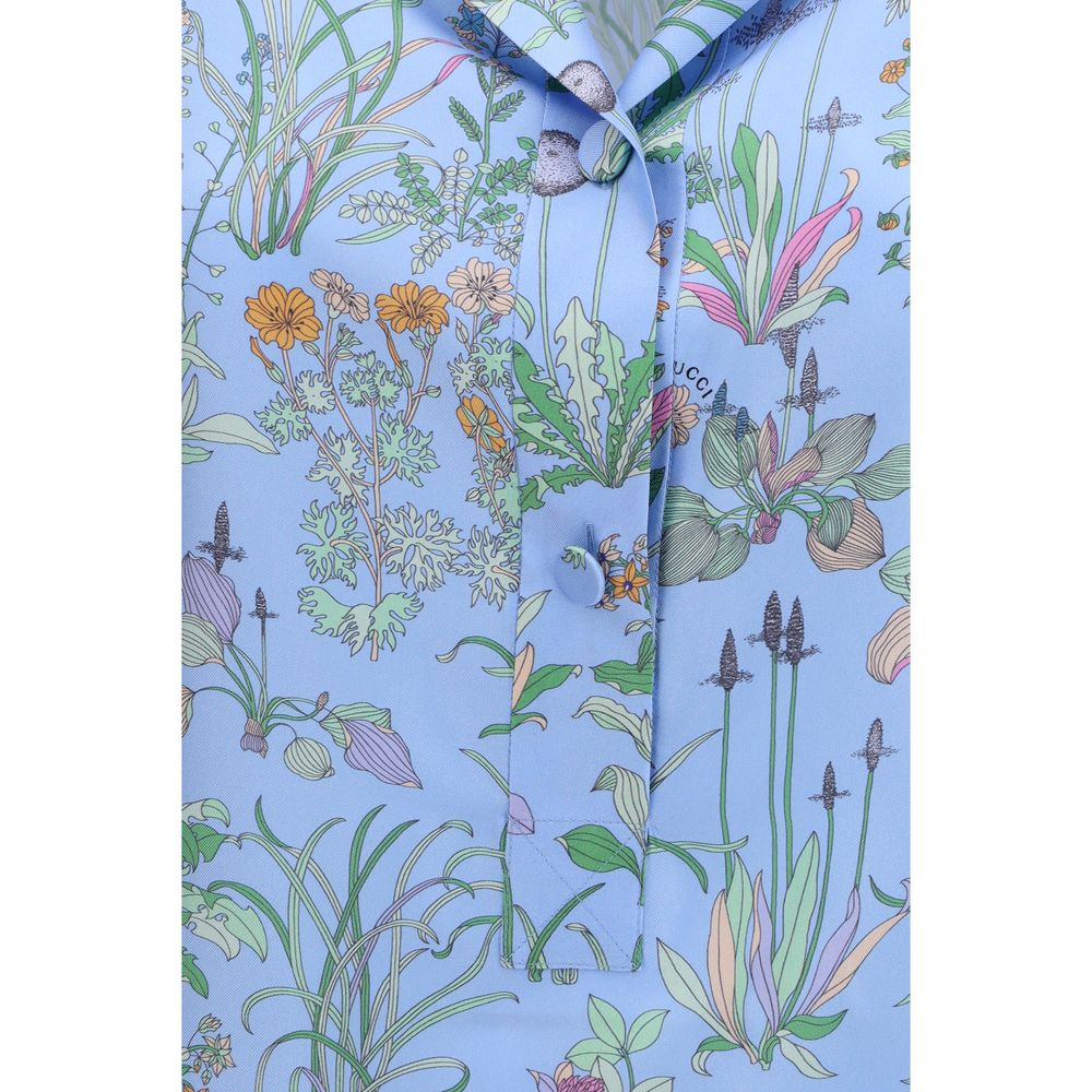 Shirt by Gucci for women in silk twill light-blue, patterned, floral & print showcases a sublime silhouette, artfully detailed with a sublime and for a sophisticated, sublime finish.