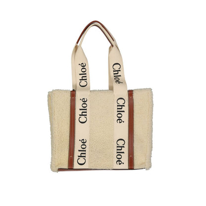 Tote Bag by Chloé for women in fur beige & signature features an jet-set Fur Tote Bag design with a secure , ample , and versatile handle for an jet-set finish.
