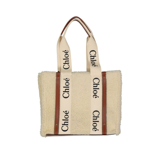 Tote Bag by Chloé for women in fur beige & signature features an jet-set Fur Tote Bag design with a secure , ample , and versatile handle for an jet-set finish.