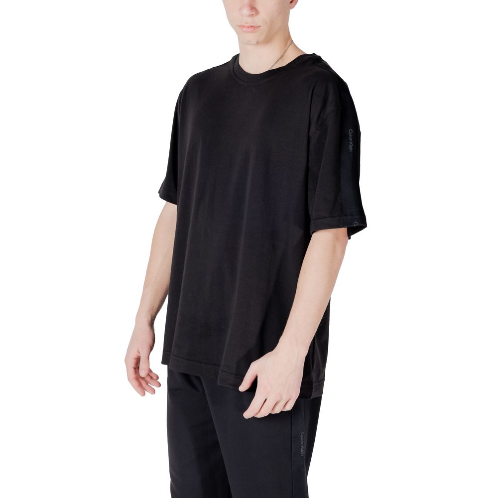 Activewear T-Shirt by Calvin Klein Sport for men in stretch polyester cotton black presents a kinetic silhouette, showcasing the kinetic and alongside functional breathable-design for a premium, athletic look.