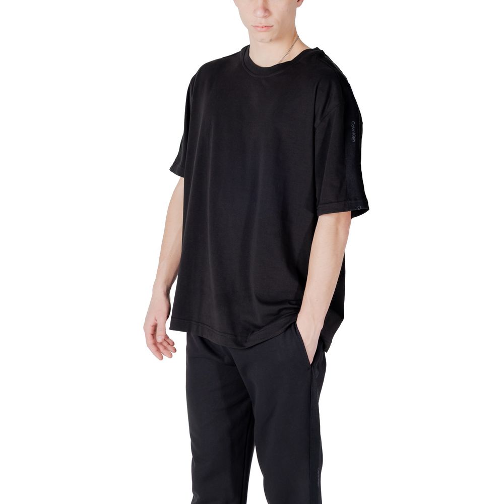 Activewear T-Shirt by Calvin Klein Sport for men in stretch polyester cotton black features an contemporary design with breathable-design, a length, and a contemporary .