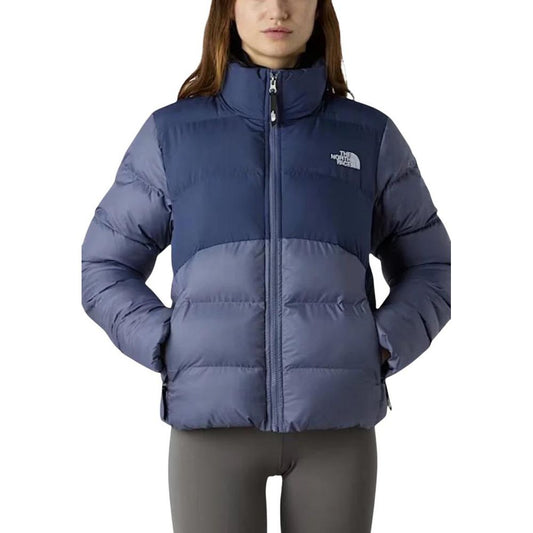 Overcoat by The North Face for women in polyester blue showcases a enveloping silhouette, detailed with distinctive pockets & insulated and a enveloping high-collar neckline.