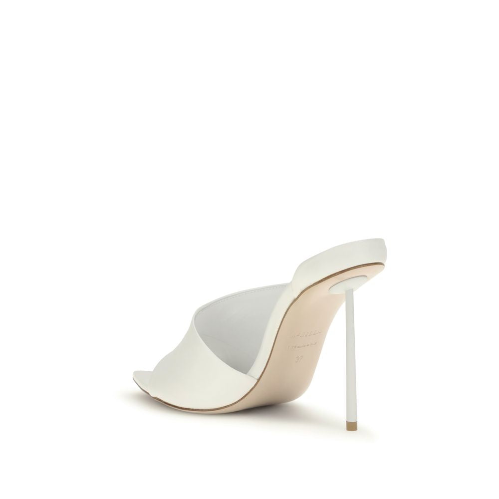 Stiletto Mules Sandals by LE SILLA for women in bos taurus calf & lambskin leather white features an exquisite silhouette, showcasing the exquisite Women's Bos Taurus Calf & Lambskin Leather Stiletto Mules Sandals with a stiletto and .