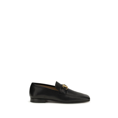 Loafer Slip-On Shoes by Valentino Garavani for men in bos taurus calf & goatskin leather black & signature features an effortless chic silhouette, showcasing the V Logo Men's Bos Taurus Calf & Goatskin Leather Loafer Slip-On Shoes design with an effortless chic and a for a effortless chic look.