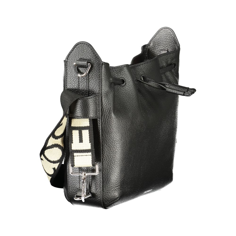 Drawstring Handbag by Coccinelle for women in leather black presents a ornamental silhouette, showcasing a secure drawstring, ample internal-pockets, and versatile shoulder-strap & adjustable-strap for a ornamental finish.