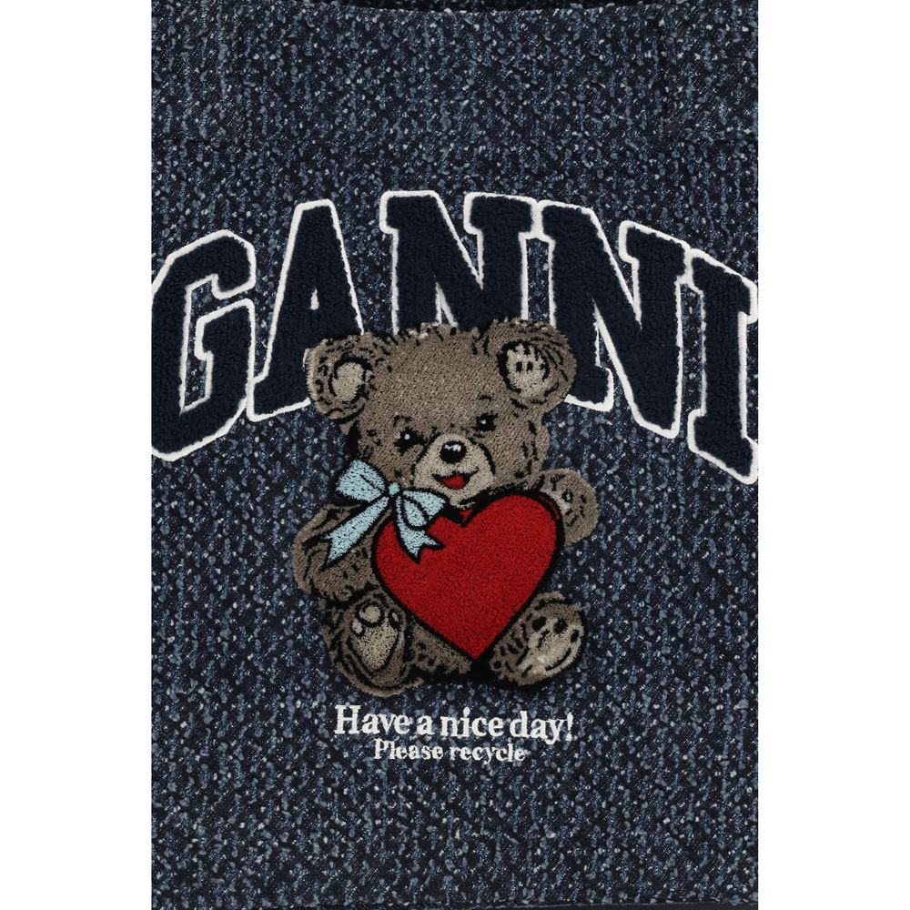 Medium Tote Shoulder Bag by Ganni for women in denim cotton blue & signature features a effortless chic silhouette with a secure , ample single-compartment, and versatile handle for a effortless chic finish.