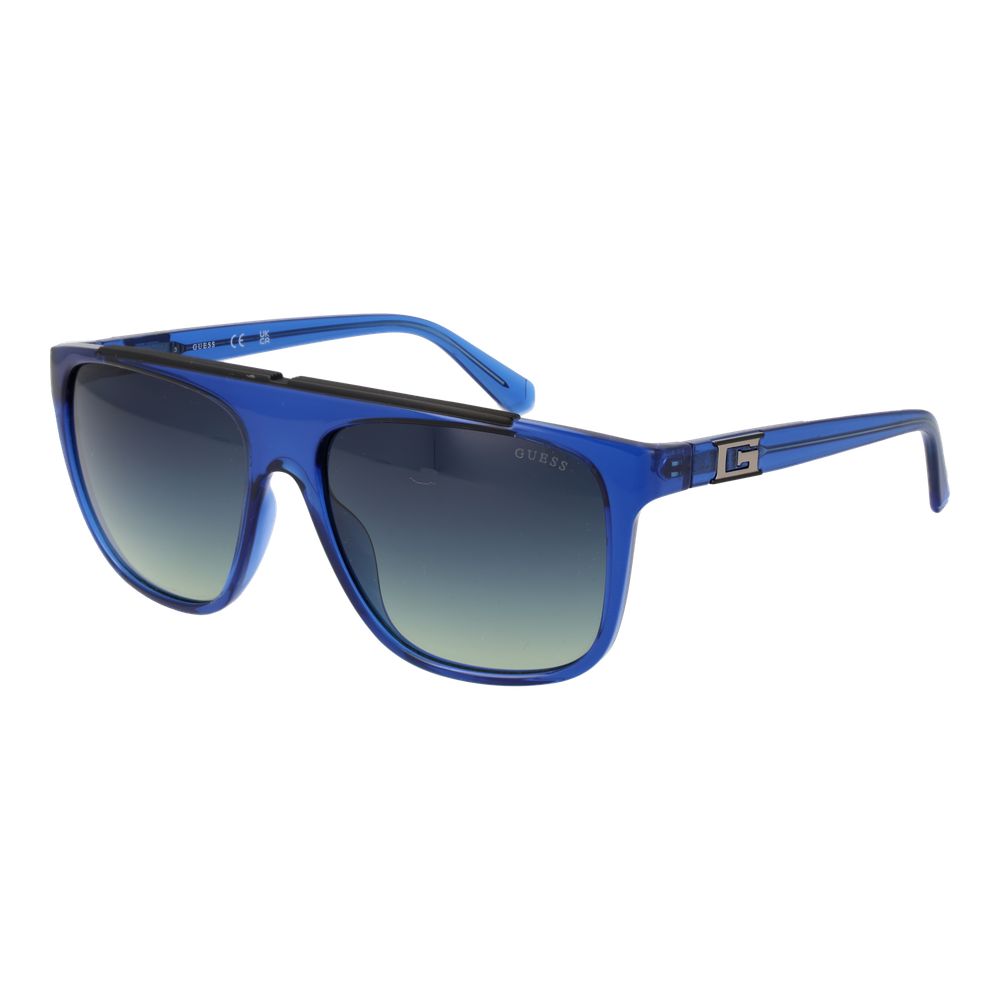 Sunglasses by Guess for men in stainless steel and blue featuring an opulent full-rim square frame design with a sophisticated blue coloured frame finish and high-performance gradient category-3-dark-tint lens.