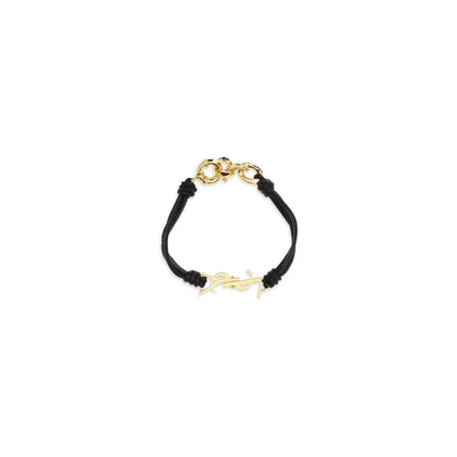 Bracelet by Saint Laurent for women in denim cotton black & gold showcases a cosmopolitan silhouette, artfully capturing the essence of the cosmopolitan Cassandre Women's Cord Wrap Bos Taurus Calf Leather Bracelet with a cosmopolitan cord wrap bracelet design.