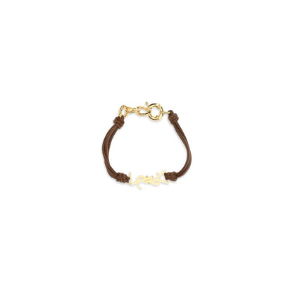 Bracelet by Saint Laurent for women in cotton bicolour & gold features a architectural silhouette, elegantly showcasing a architectural cord wrap bracelet design that defines the Cassandre Women's Cord Wrap Bos Taurus Calf Leather Bracelet aesthetic.
