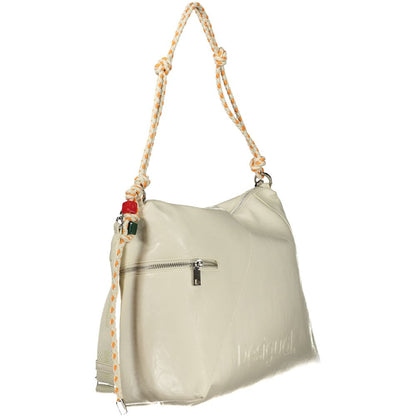 Crossbody Handbag by Desigual for women in polyurethane white presents a ornamental silhouette, showcasing a secure zipper, ample , and versatile crossbody-strap, adjustable-strap & handle for a ornamental finish.