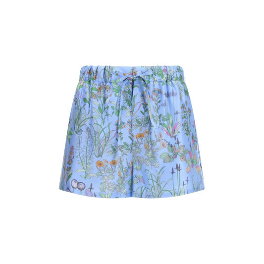 Short Trousers by Gucci for women in silk twill blue, floral & print features an sartorial design, highlighting a sophisticated regular-fit with a short cut and a refined for a truly sartorial look.