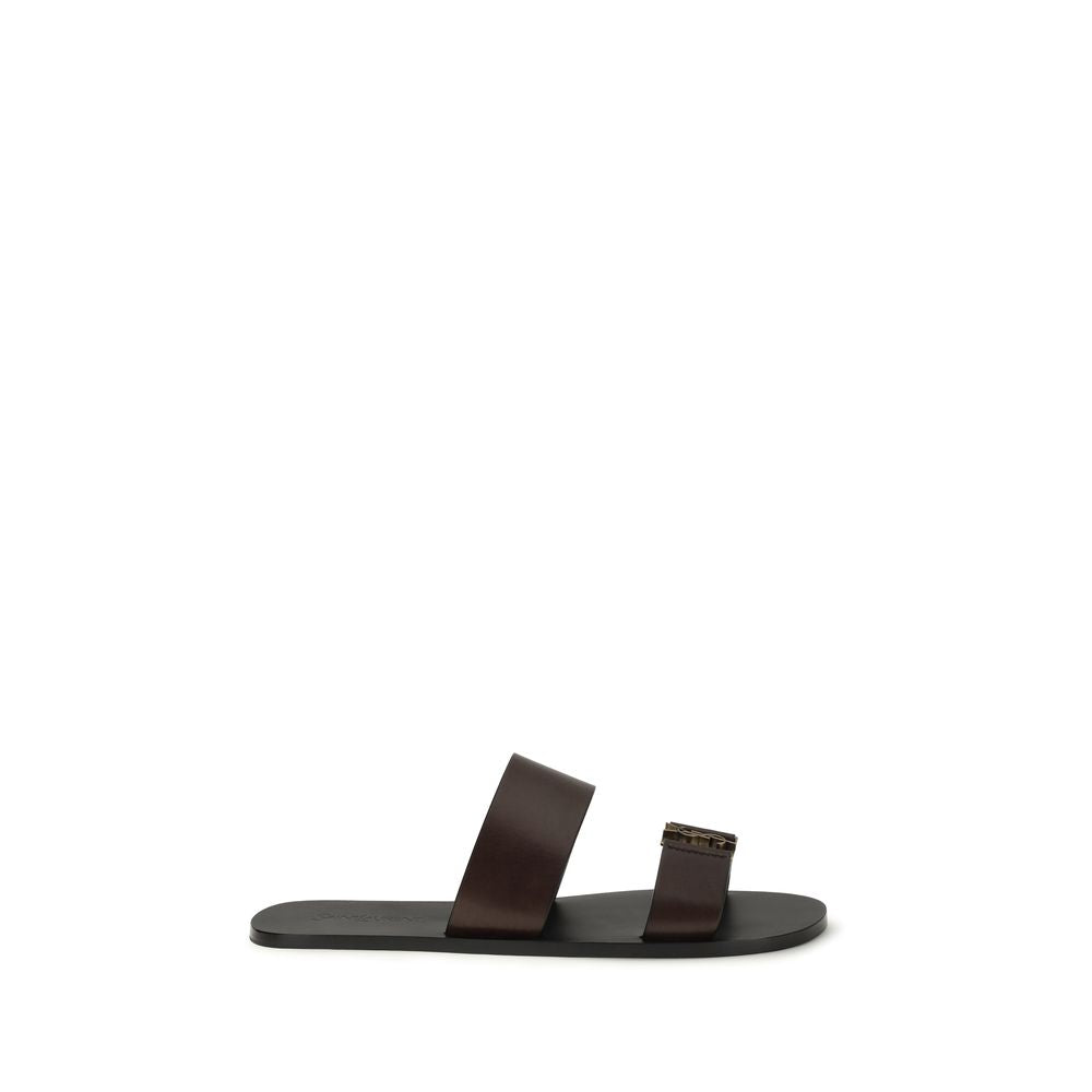 Flat Sandals by Saint Laurent for men in bos taurus calfskin leather brown & gold features an exquisite silhouette, showcasing the exquisite Cassandre Men's Bos Taurus Calfskin Leather Flat Sandals with a flat and .