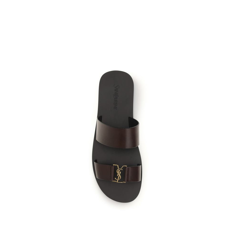 Flat Sandals by Saint Laurent for men in bos taurus calfskin leather brown & gold presents a sculptural silhouette, showcasing the Cassandre Men's Bos Taurus Calfskin Leather Flat Sandals design with a sculptural flat and for a premium look.