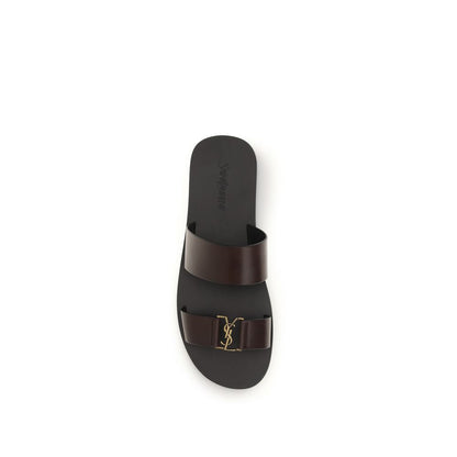 Flat Sandals by Saint Laurent for men in bos taurus calfskin leather brown & gold presents a sculptural silhouette, showcasing the Cassandre Men's Bos Taurus Calfskin Leather Flat Sandals design with a sculptural flat and for a premium look.