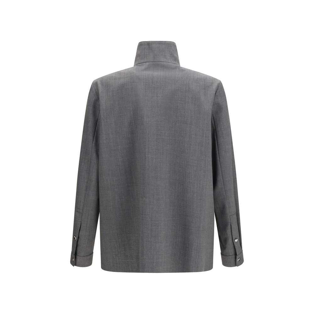 Overcoat by Valentino Garavani for men in wool & polyester gray features an voluminous silhouette, showcasing distinct pockets and a voluminous for a truly voluminous aesthetic.