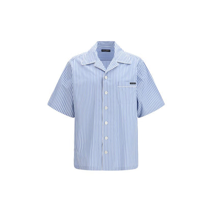 Shirt by Dolce & Gabbana for men in cotton & silk blue & striped presents a discerning silhouette, showcasing a sophisticated and short-sleeve for a truly discerning finish.