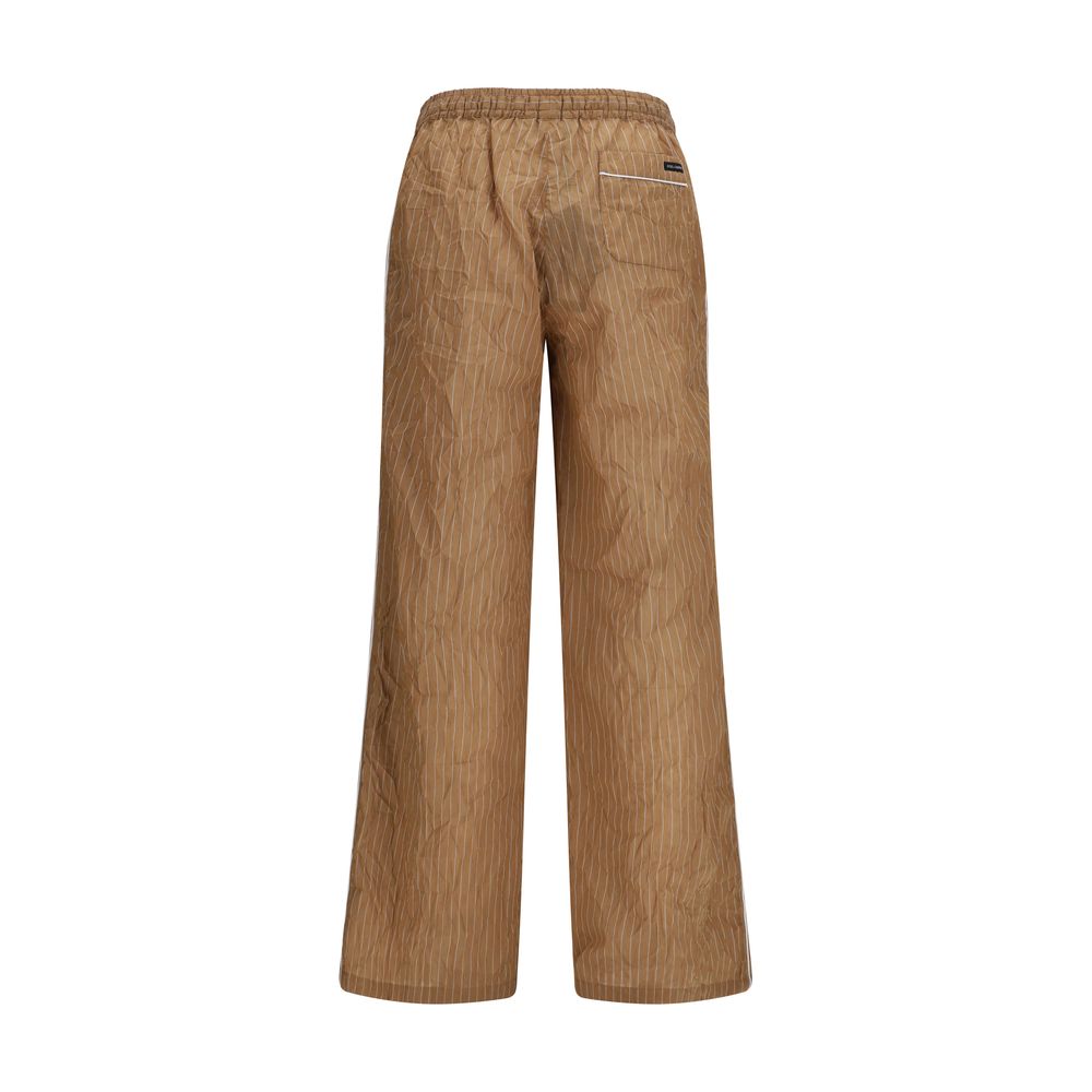Casual Pants by Dolce & Gabbana for men in cotton linen nylon & silk brown & striped features a polished silhouette with a polished relaxed-fit & regular-fit, reaching a polished long and finished with a polished .