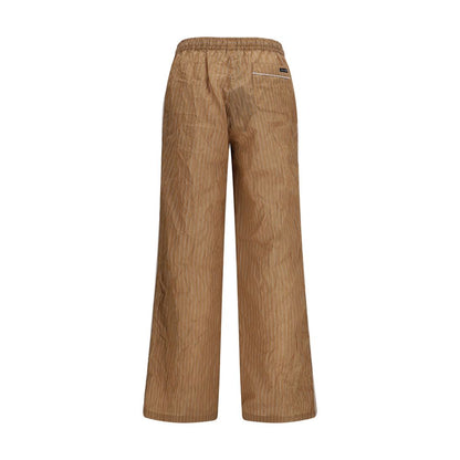 Casual Pants by Dolce & Gabbana for men in cotton linen nylon & silk brown & striped features a polished silhouette with a polished relaxed-fit & regular-fit, reaching a polished long and finished with a polished .
