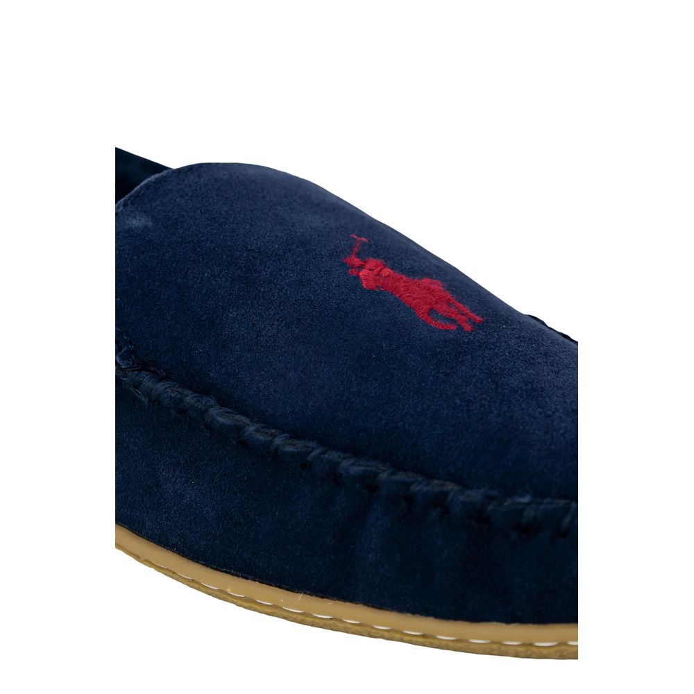 Slippers by Ralph Lauren for men in suede leather & faux fur and blue presents a sculptural silhouette as Men's Suede Leather & Faux Fur Slippers, featuring a sculptural and a sculptural for refined comfort.