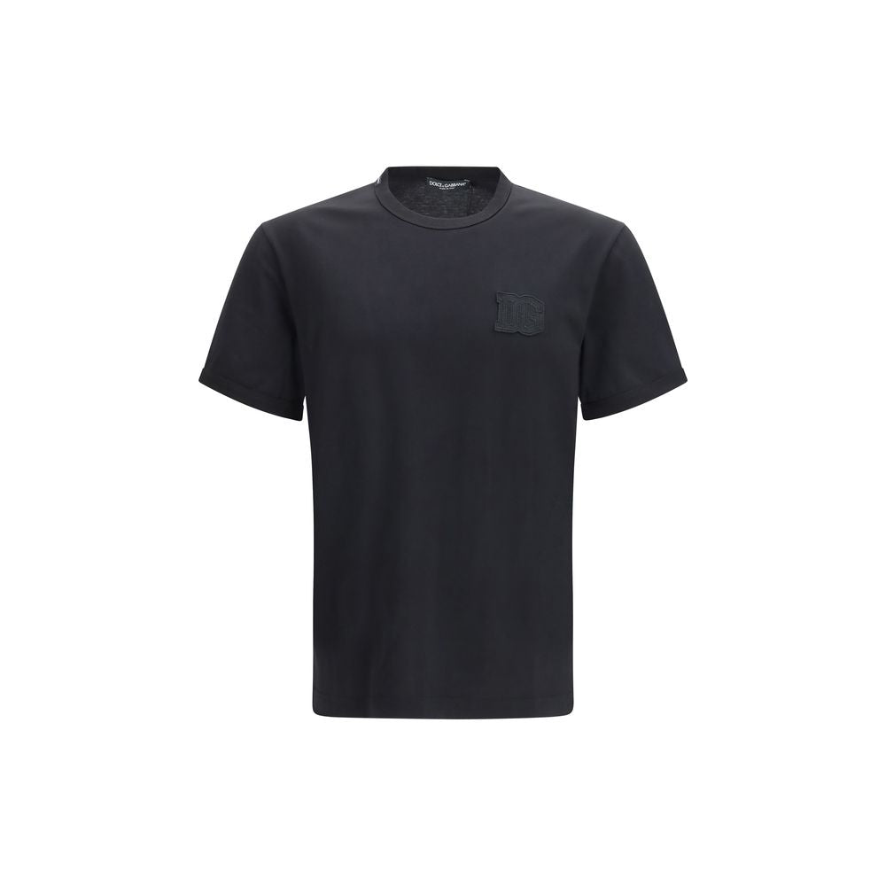 T-Shirt by Dolce & Gabbana for men in cotton black showcases a unassuming silhouette, artfully detailed with a refined crew neckline and unassuming short-sleeve for a sophisticated, contemporary look.