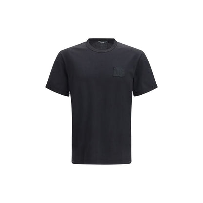 T-Shirt by Dolce & Gabbana for men in cotton black showcases a unassuming silhouette, artfully detailed with a refined crew neckline and unassuming short-sleeve for a sophisticated, contemporary look.