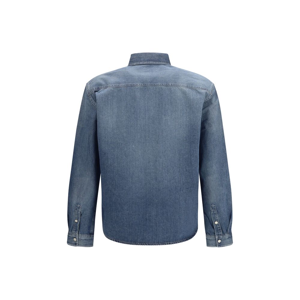 Shirt by Saint Laurent for men in denim cotton blue features an architectural silhouette with a refined and elegant for a architectural look.
