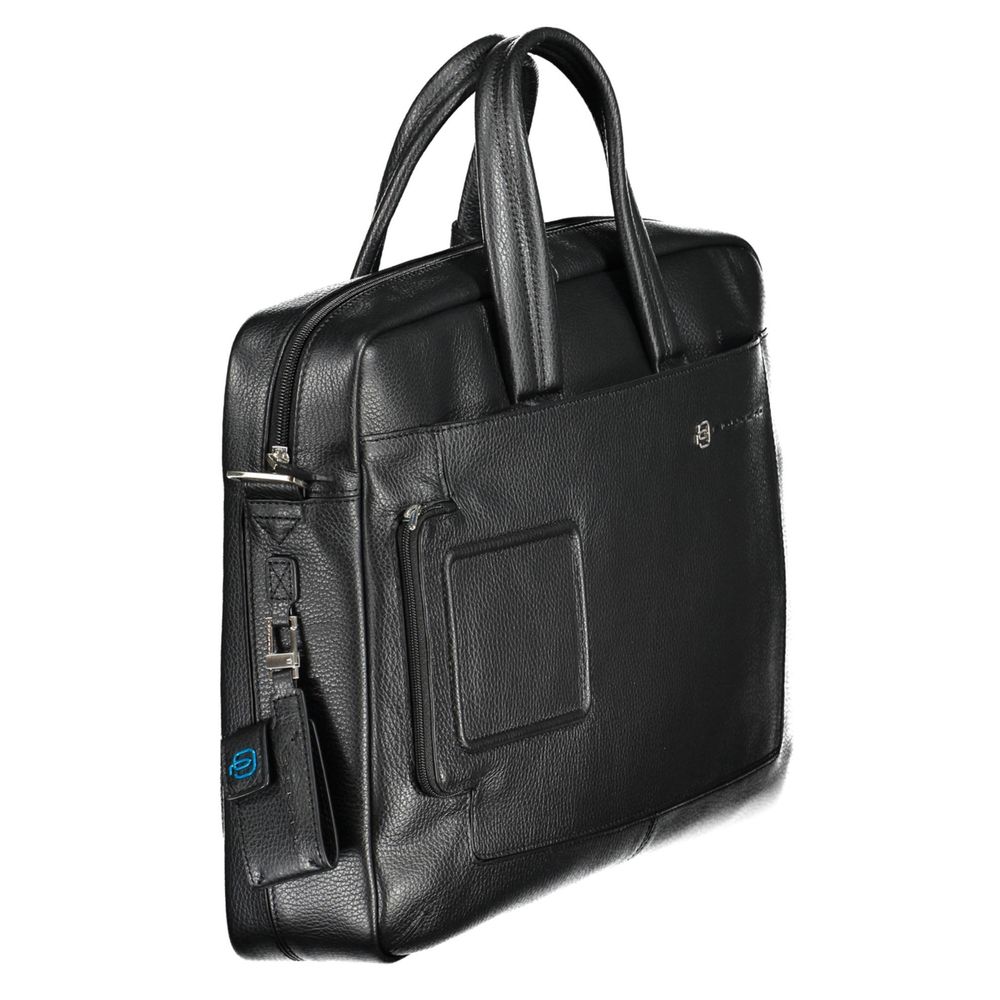 Briefcase Handbag by Piquadro for unisex in leather black presents a ornamental silhouette, showcasing a secure zipper, ample external-pockets & laptop-compartment, and versatile shoulder-strap, adjustable-strap, detachable-strap & handle for a ornamental finish.