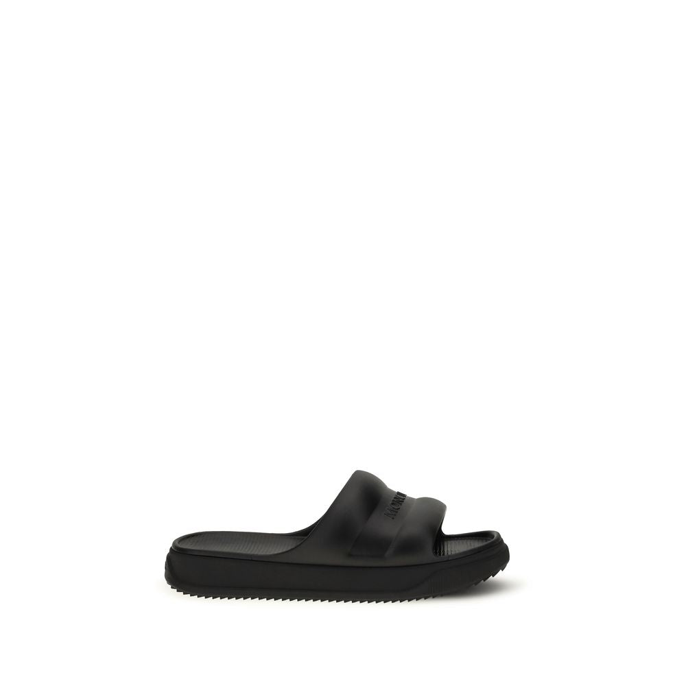 Slider Sandals by Moncler for women in rubber black features an statuesque Women's Rubber Slider Sandals silhouette with a refined and elegant .