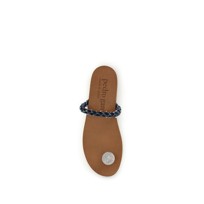 Flat Slider Thong Sandals by Pedro García for women in bos taurus calf leather & denim brown presents a sculptural silhouette, showcasing the Women's Bos Taurus Calf Leather & Denim Flat Slider Thong Sandals design with a sculptural flat and for a premium look.